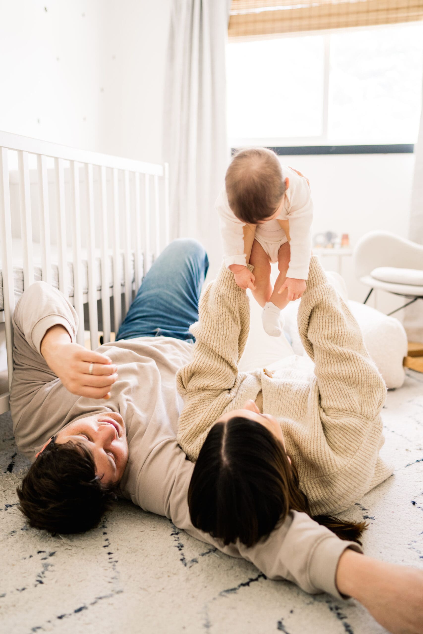 in home family and newborn session with new baby in a lifestyle session