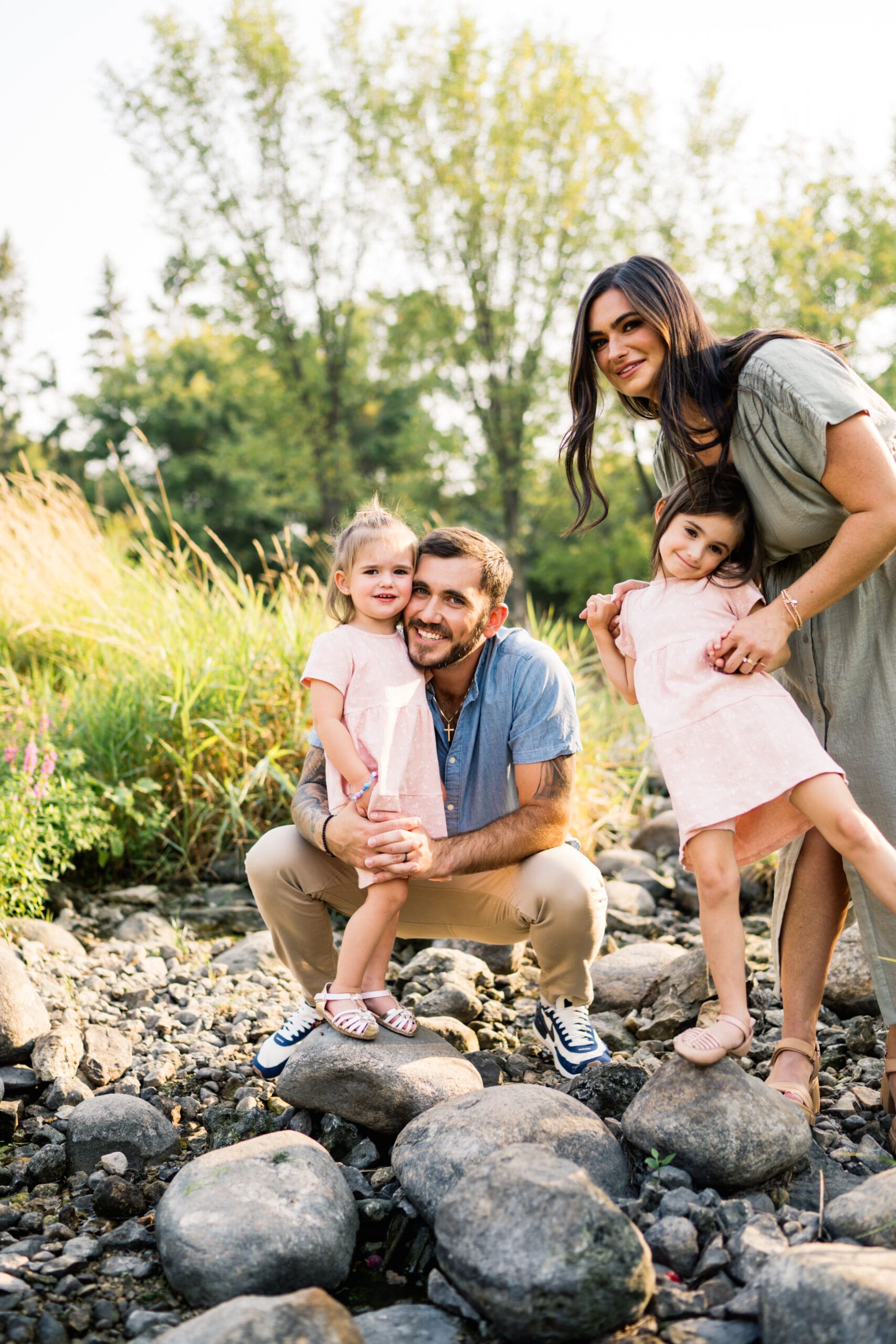 winnipeg family photogrpaher captures family outdoors at a creek in woodhaven winnipeg