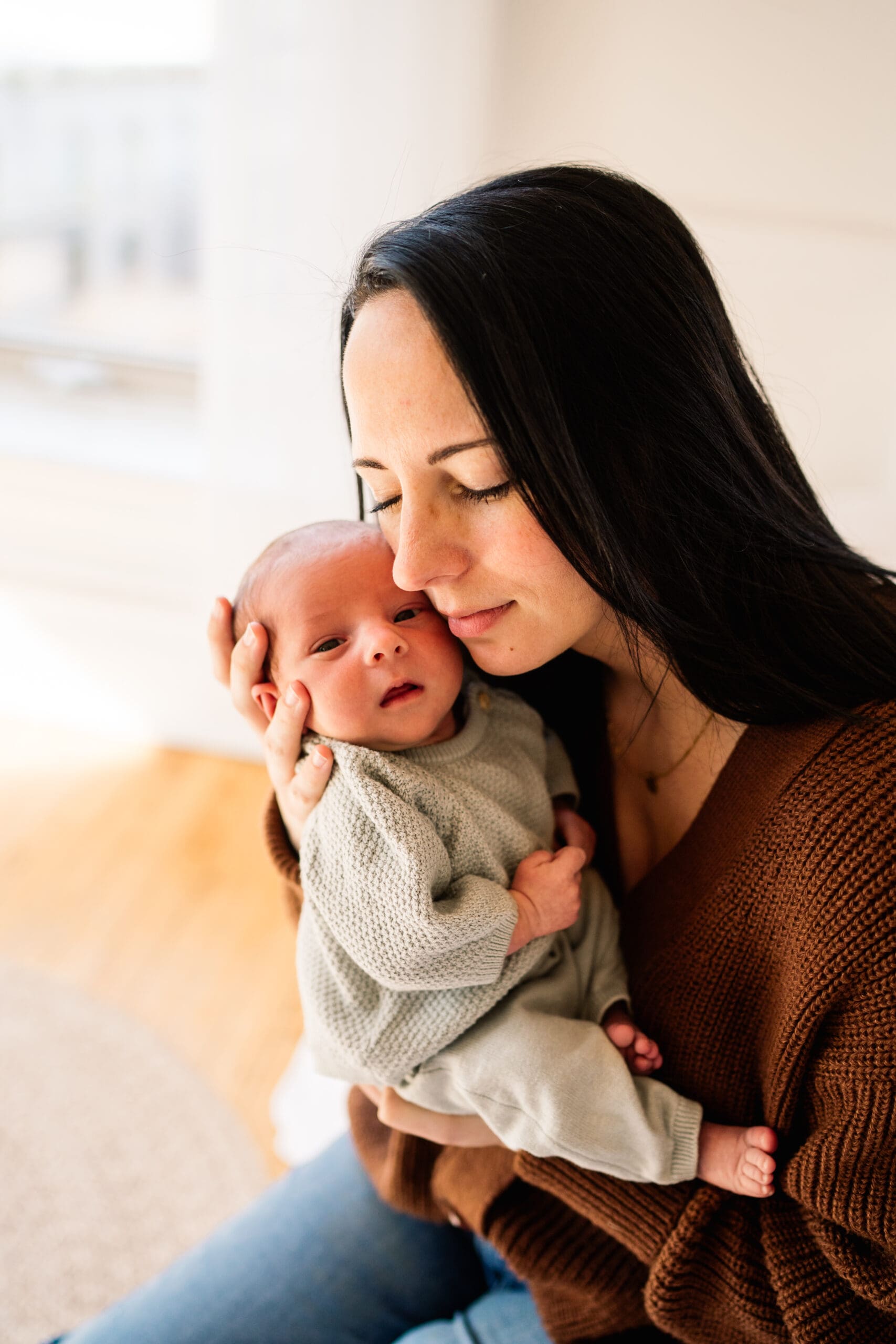 winnipeg newborn photographer capturing lifestyle newborn session in studio