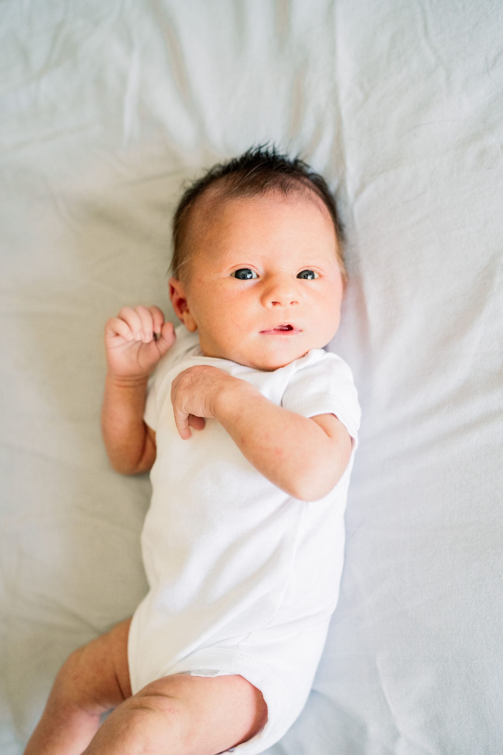 winnipeg newborn lifestyle photographer who specializes in candid, natural and timeless photographs