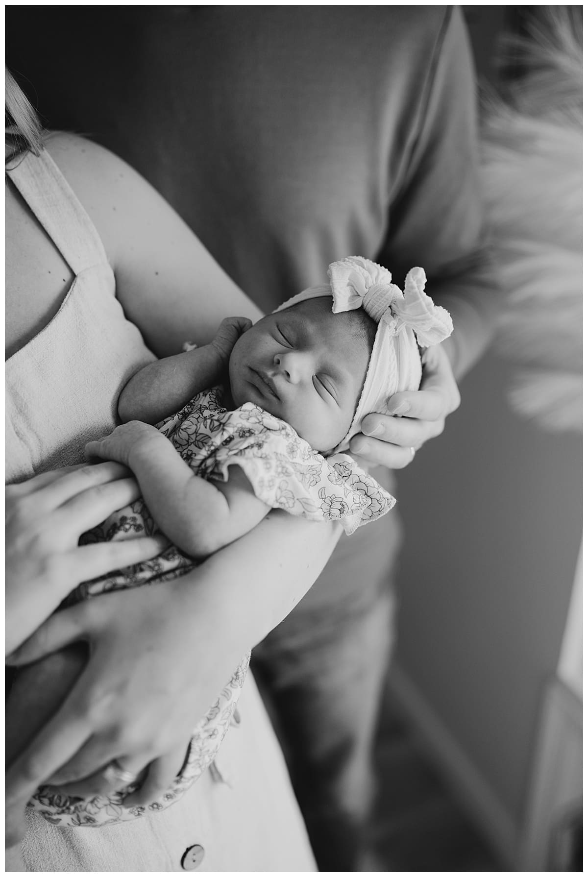 winnipeg in home newborn photoshoot with baby girl in winnipeg