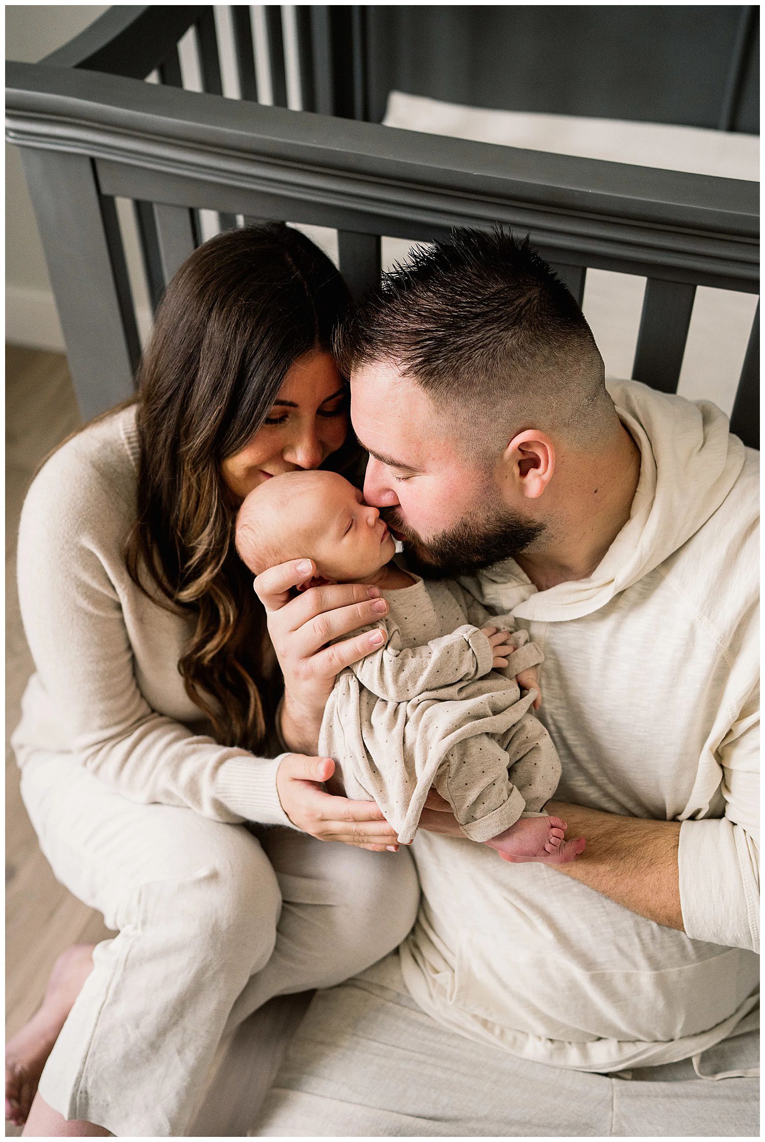 winnipeg newborn lifestyle photographer with an in home baby and parents