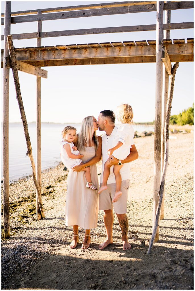 Winnipeg family photoshoot at Matlock Beach in the summer with beautiful morning light running around with their son and daughter.