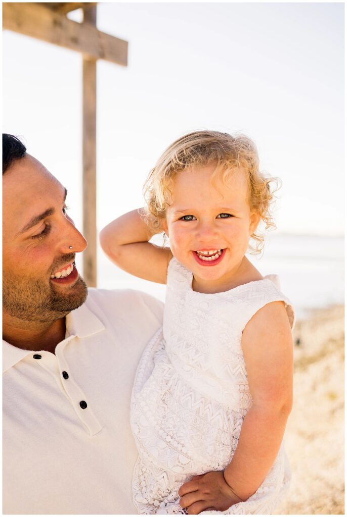 Winnipeg family photoshoot at Matlock Beach in the summer with beautiful morning light running around with their son and daughter.