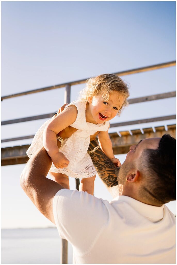 Winnipeg family photoshoot at Matlock Beach in the summer with beautiful morning light running around with their son and daughter.
