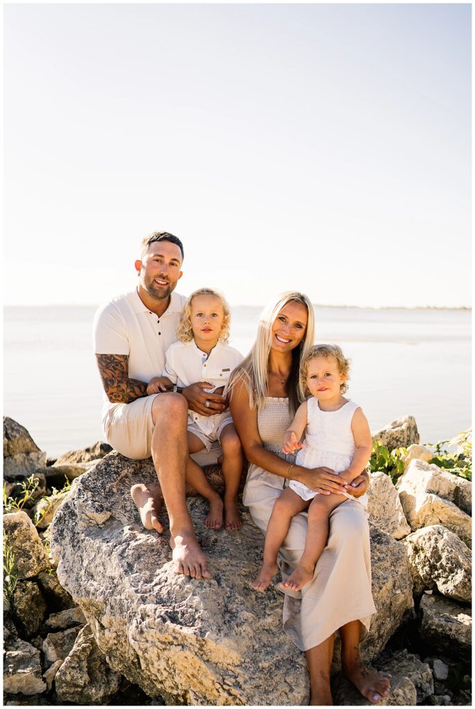 Winnipeg family photoshoot at Matlock Beach in the summer with beautiful morning light running around with their son and daughter.
