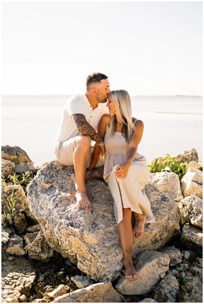 Winnipeg family photoshoot at Matlock Beach in the summer with beautiful morning light running around with their son and daughter.