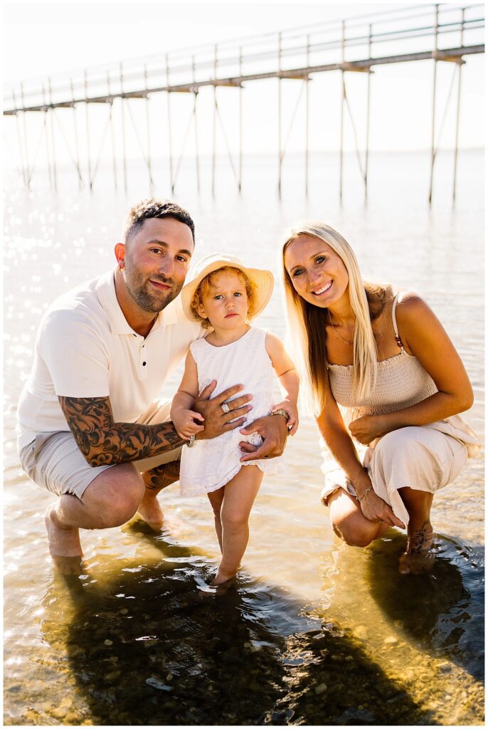 Winnipeg family photoshoot at Matlock Beach in the summer with beautiful morning light running around with their son and daughter.