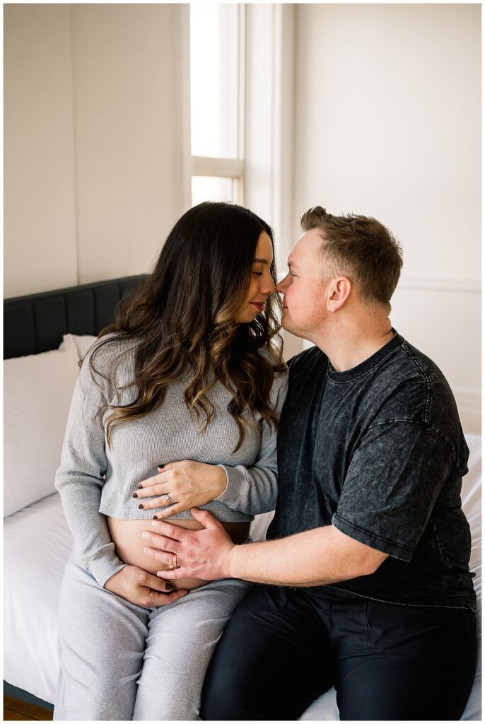 Winnipeg maternity photographer captures twin pregnancy in studio in downtown winnipeg photography studio.