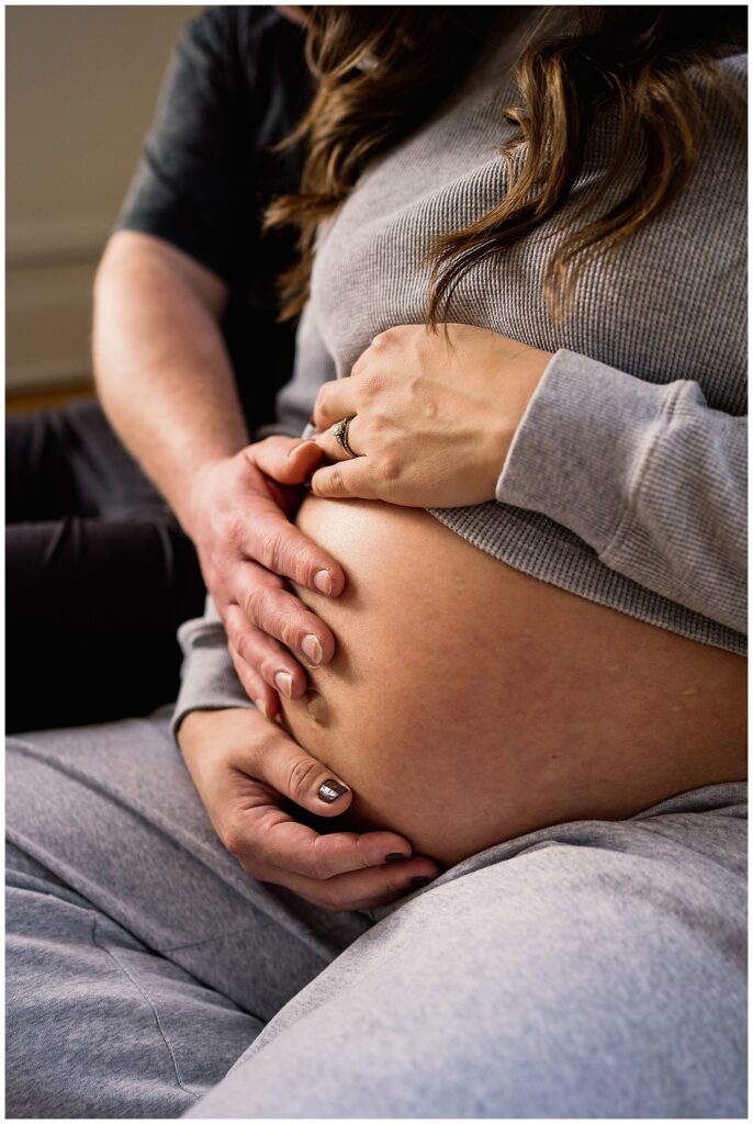 Winnipeg maternity photographer captures twin pregnancy in studio in downtown winnipeg photography studio.