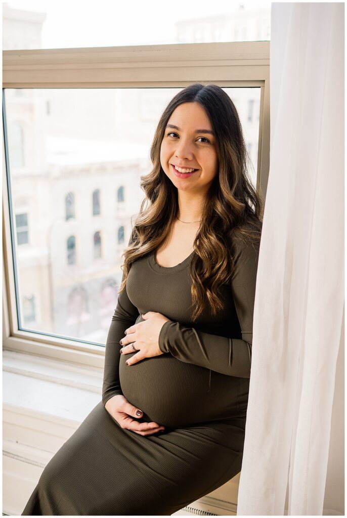 Winnipeg maternity photographer captures twin pregnancy in studio in downtown winnipeg photography studio.