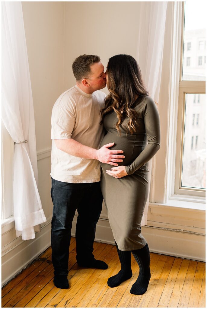 Winnipeg maternity photographer captures twin pregnancy in studio in downtown winnipeg photography studio.