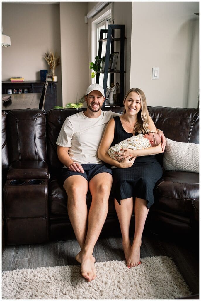 In home newborn session Winnipeg with baby Emma and parents