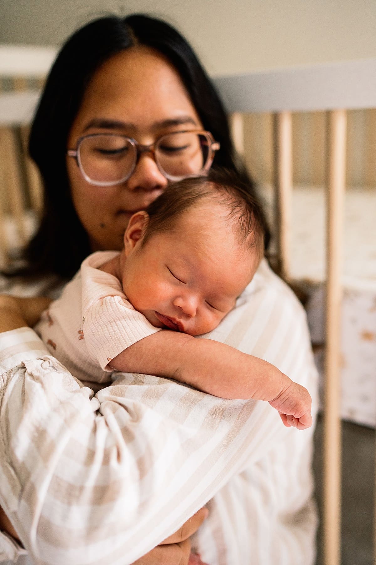 in home newborn photoshoot with a brand new baby with their cute dogs in their home