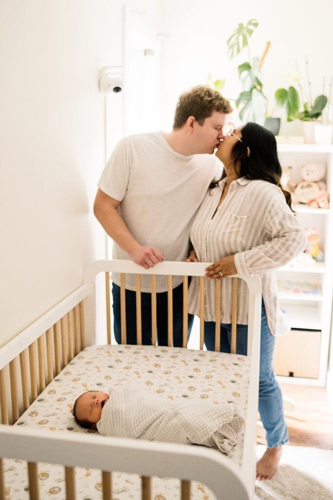 in home newborn photoshoot with a brand new baby with their cute dogs in their home