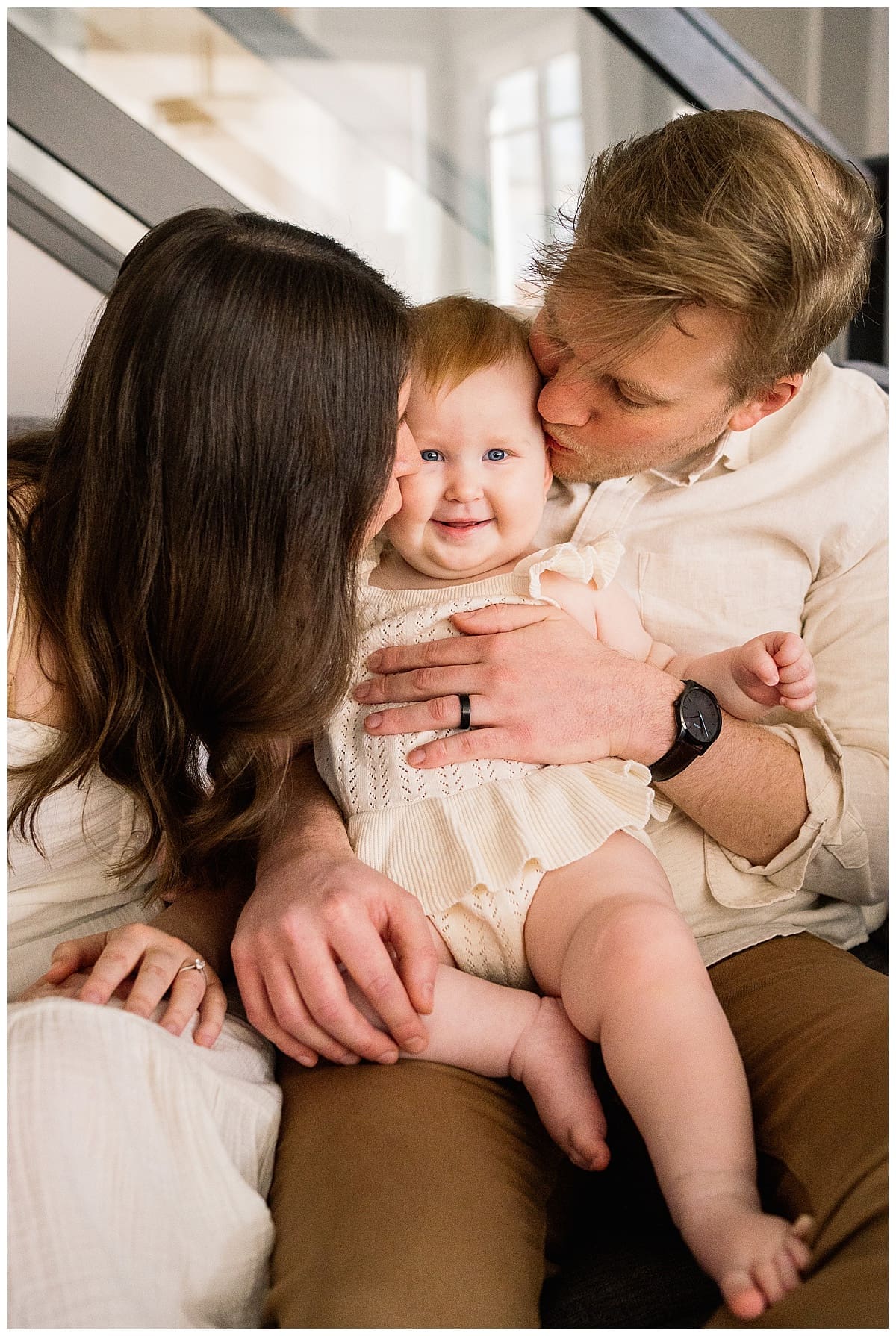 In home family session Winnipeg with parents and baby girl