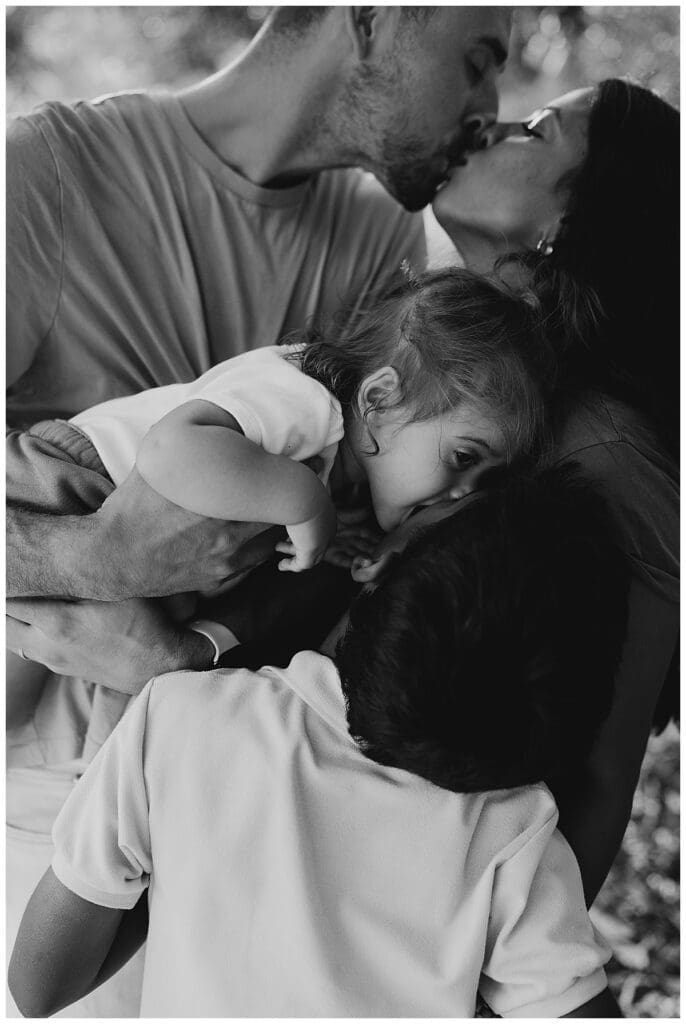 Winnipeg family photographer at Assiniboine Park with family of four