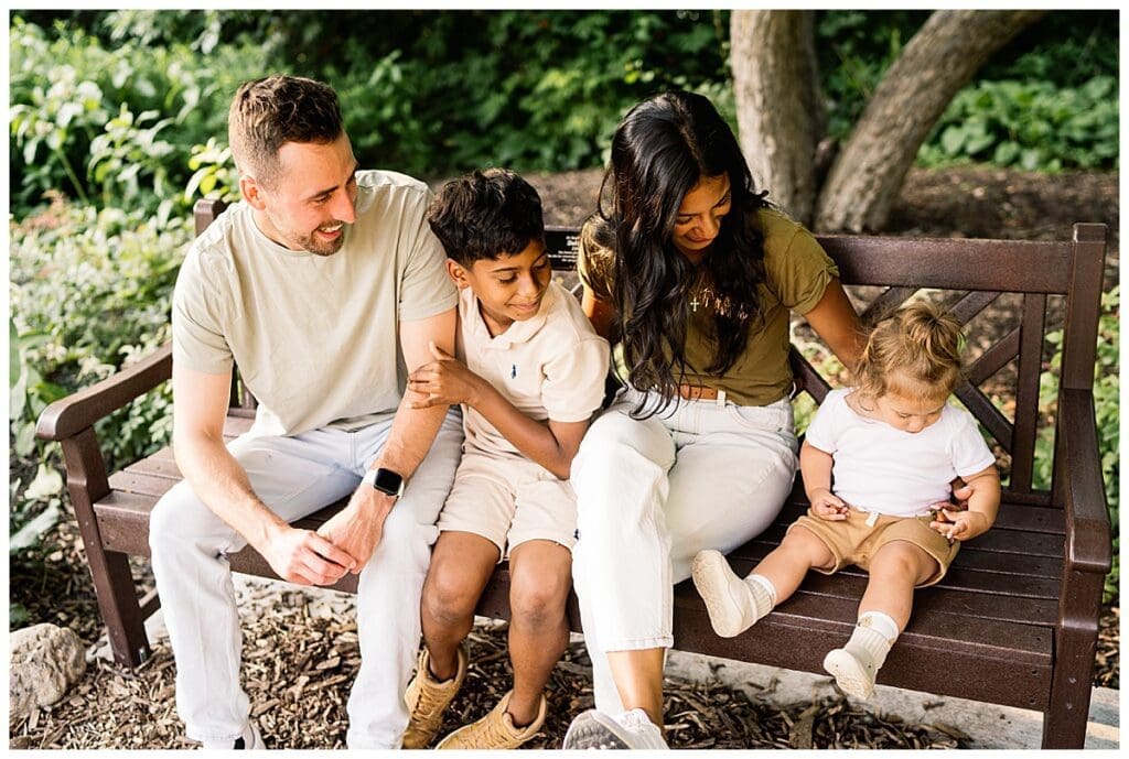 Winnipeg family photographer at Assiniboine Park with family of four